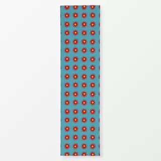 Tischläufer Rote Sonnensterne auf türkis